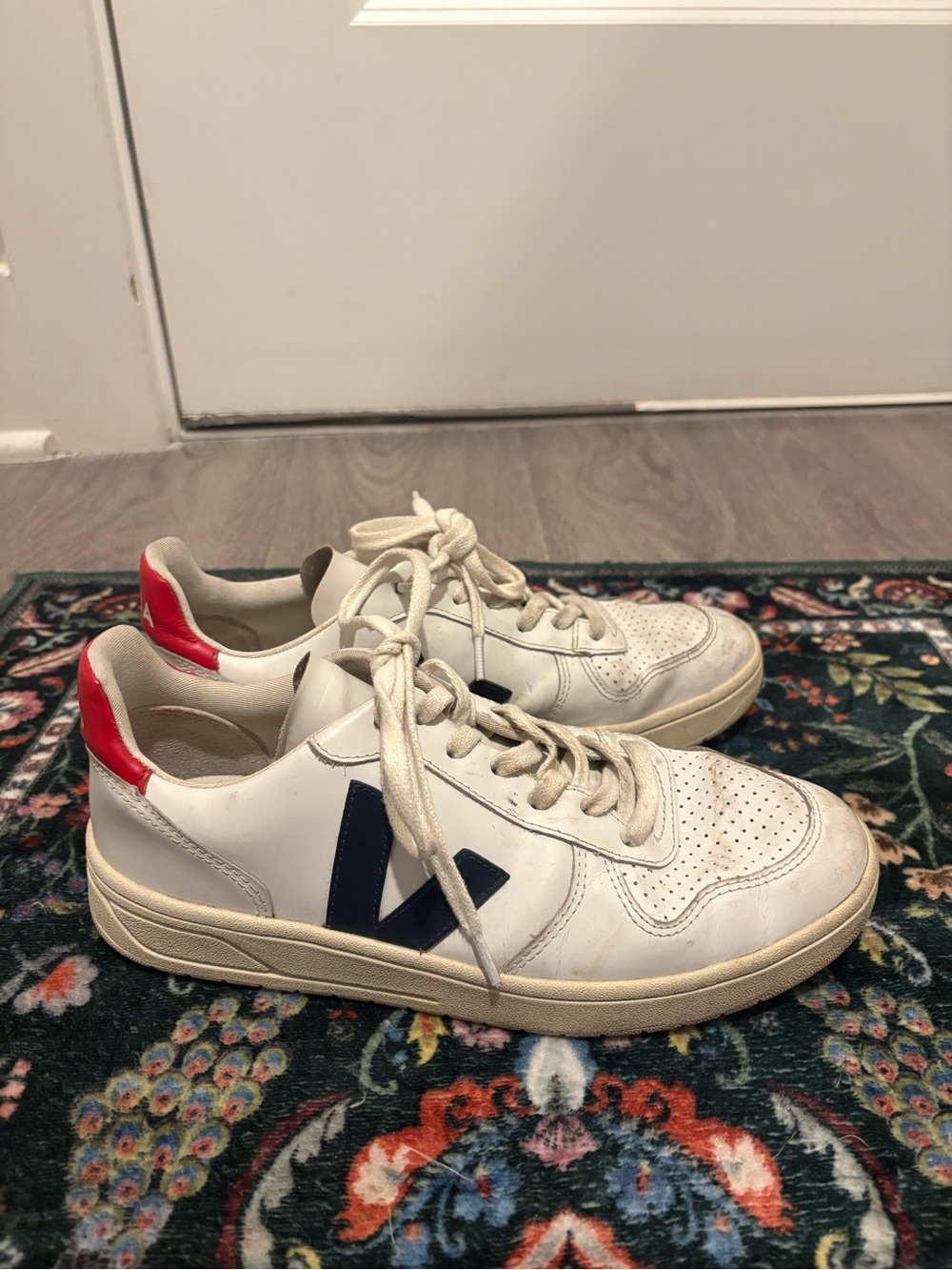 White Leather Men's Sneakers with Navy Accent and Red Heel